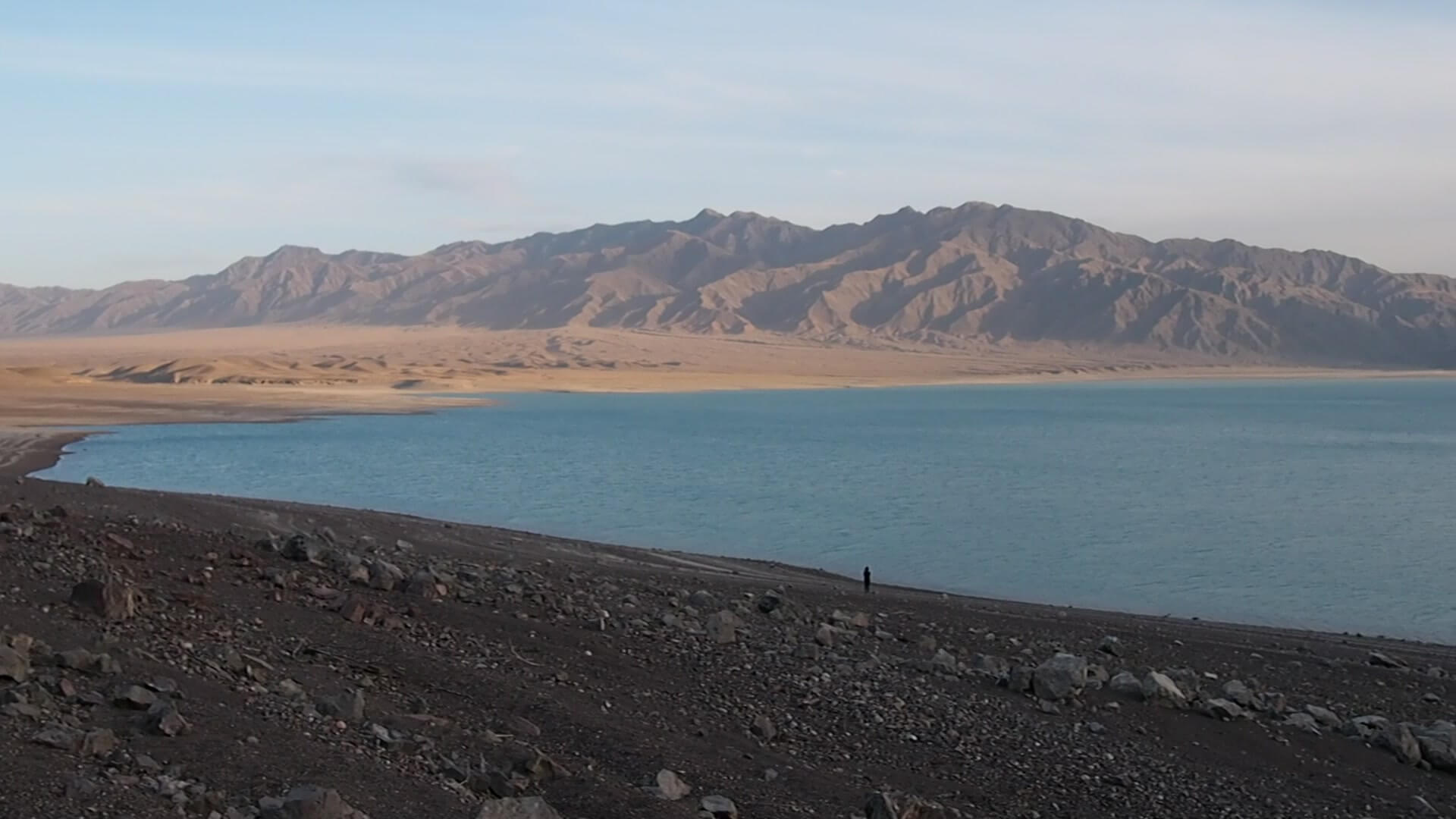 Bartogai Reservoir: Turquoise Water at the Foot of the Assy Road