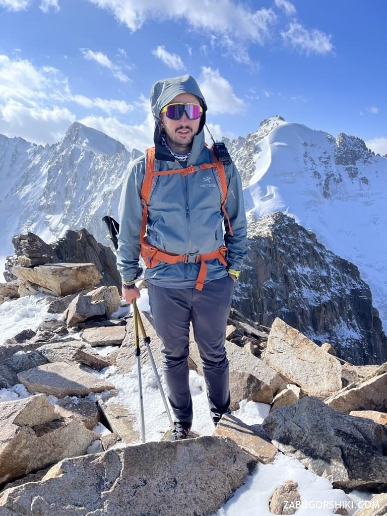 Climber on the summit of Peak BOKS (4,240 m)